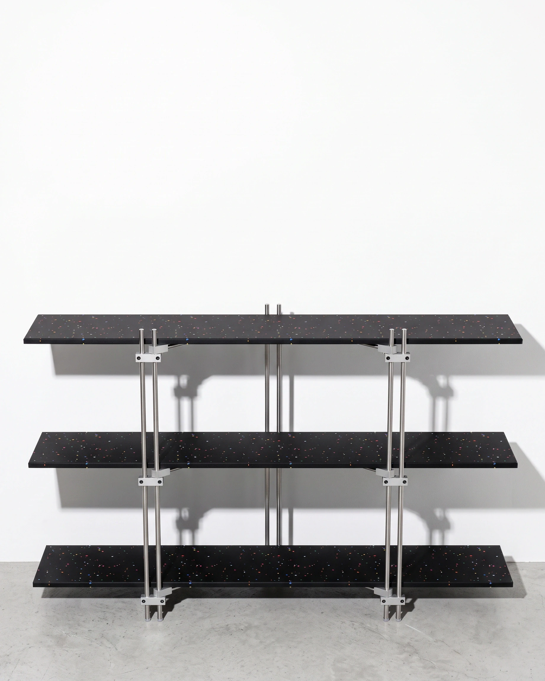 Doorman, tiered console 1200, black, colour flecks: front view