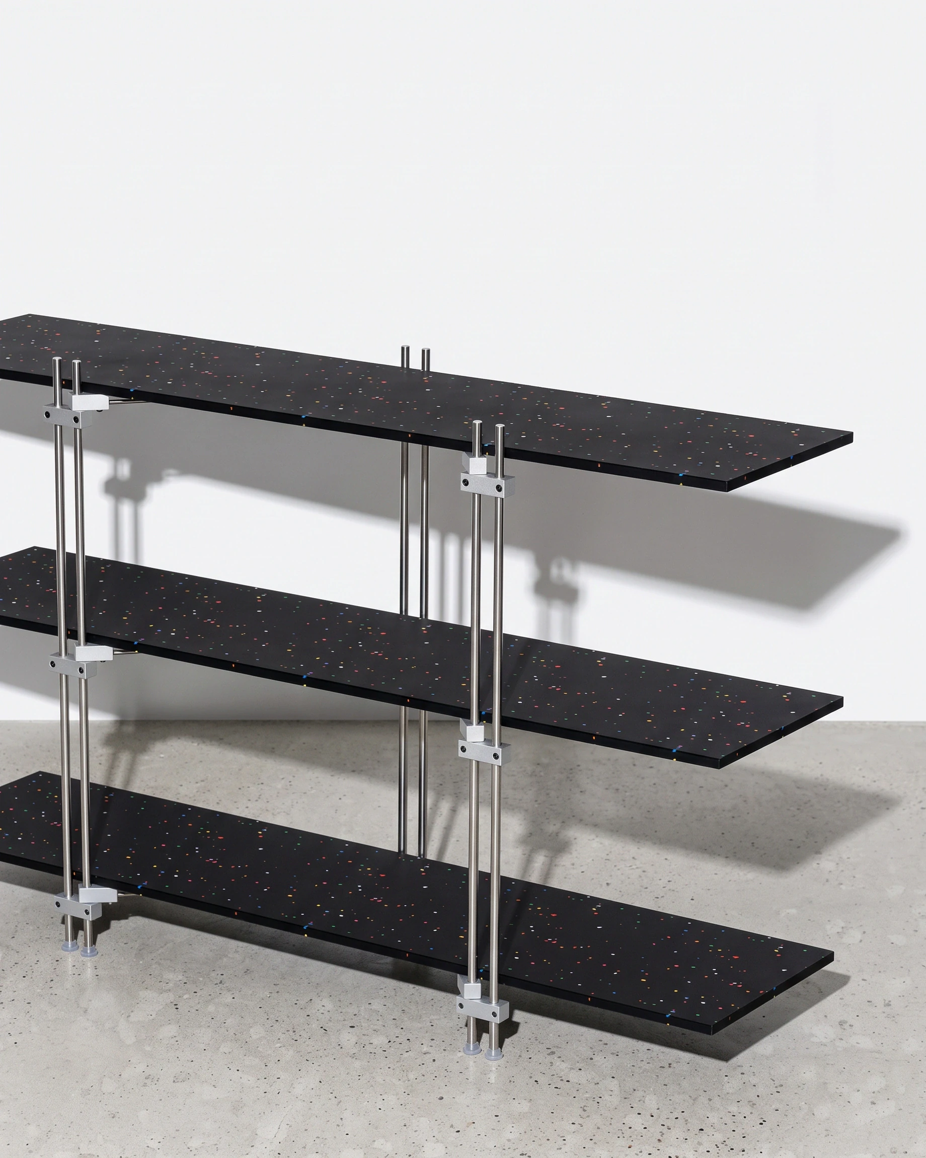 Doorman, tiered console 1200, black, colour flecks: front right view