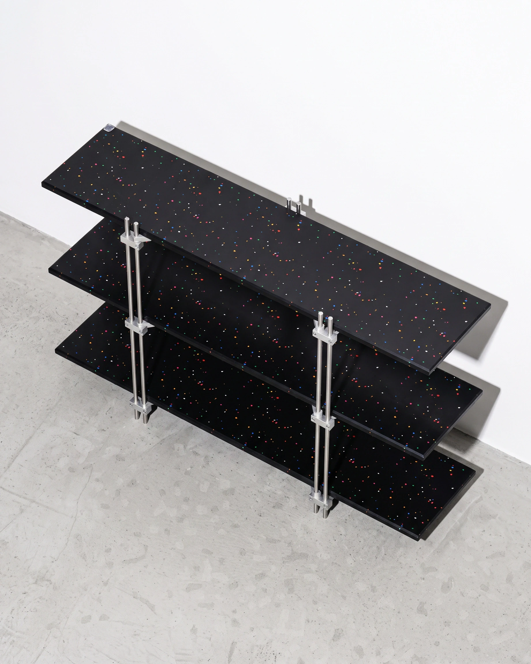 Doorman, tiered console 1200, black, colour flecks: top view