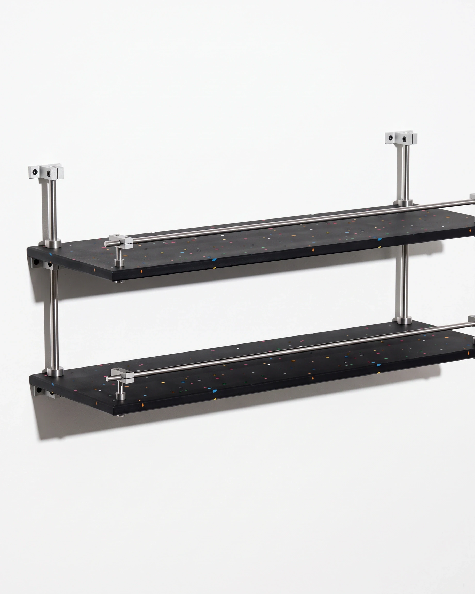 Bookseller, wall shelf, two tiers 60 × 20, black, colour flecks: front left view